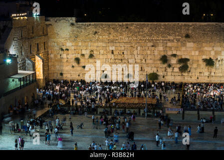 Many believers at the Wailing Wall in the evening, Old Town, Jerusalem, Israel Stock Photo