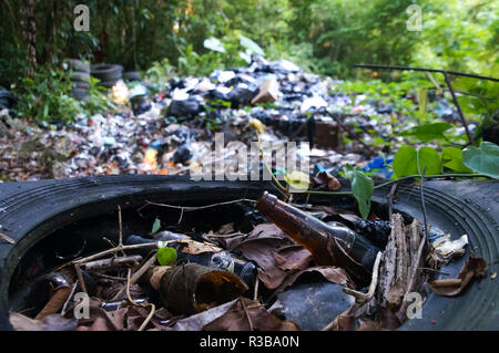 Garbage pile in trash dump or landfill in jungle of Guatemala. Pollution concept. Stock Photo