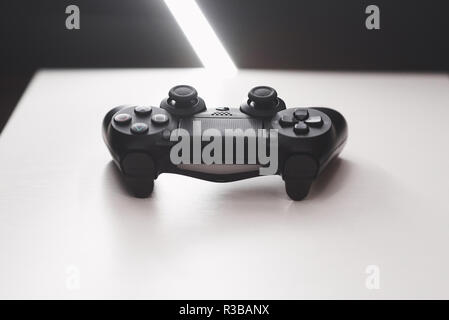 Joystick from the game console on a white table Stock Photo