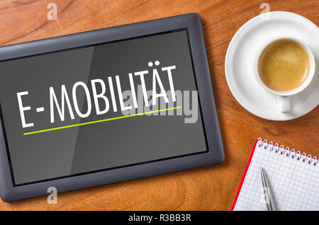 tablet on desk - e-mobility Stock Photo