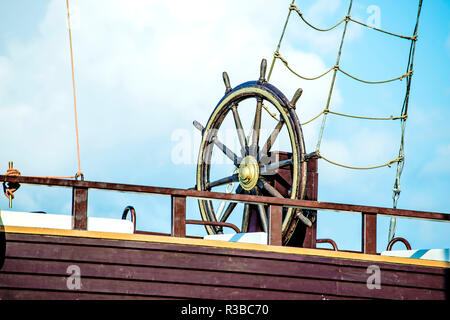 steering wheel of an old sailboat Stock Photo