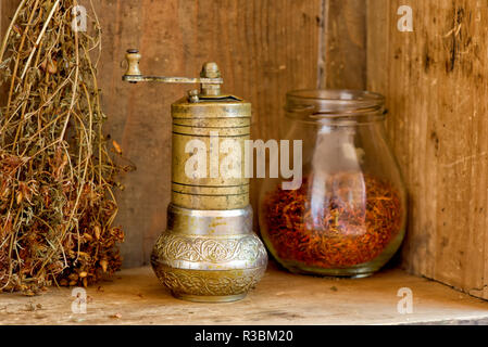 Vintage manual spice grinder on wooden background Stock Photo - Alamy