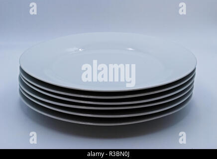 stack of plates on a white background Stock Photo