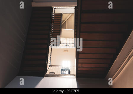 Old symmetrical stair from below Stock Photo