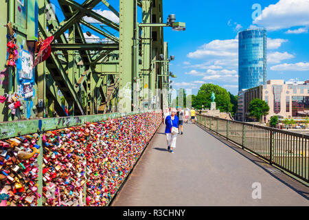 Wedding locks at the Hohenzollern Bridge in Cologne, Germany Stock Photo