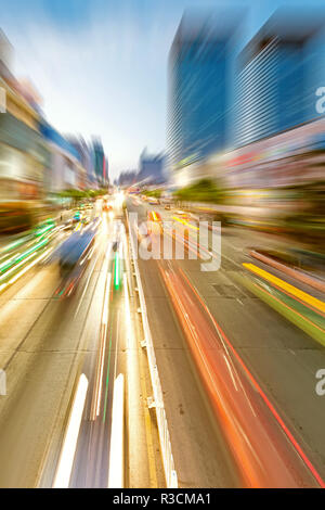 the light trails on the modern building background in shanghai china Stock Photo