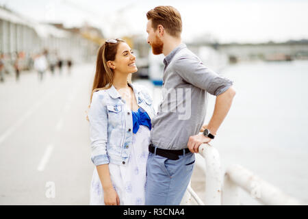 Cute couple enjoying time spent together outdoors Stock Photo