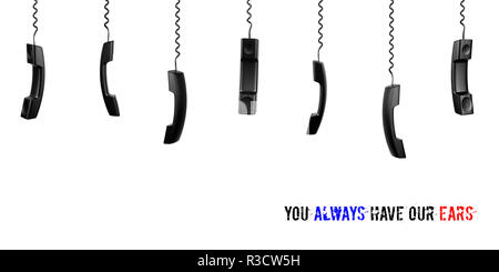 Black handsets hanging on twisted cords on a white background. Isolated. Concept call center, customer service, rescue service/ Stock Photo