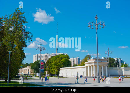 VDNKh, exhibition area, with Ostanskinky district blocks of flats and Ostankino tv tower in background, Moscow, Russia Stock Photo