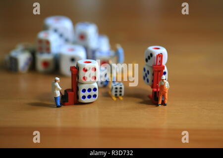 dices worker on desk Stock Photo