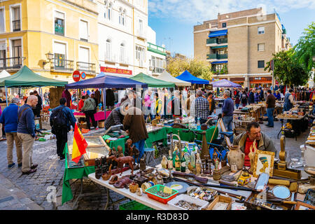 Seville, Spain - November 13, 2018: street flea market with unidentified people in Seville. Seville is the capital of Andalusia and the 4th largest ci Stock Photo