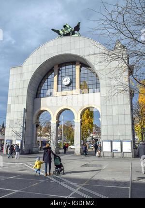 Back side of the historic landmark arch topped by Zeitgeist sculpture (the former entry of the old station that was destroyed by fire in the early 197 Stock Photo