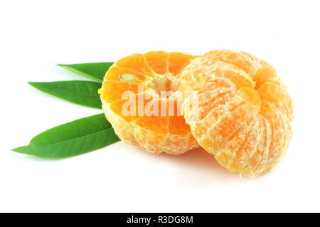 half orange fruit isolated / fresh orange Peeled slice half with green leaf isolated on white background - asia orange Stock Photo