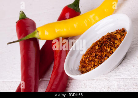 fresh pepperoni and chilli with chilli powder as closeup Stock Photo