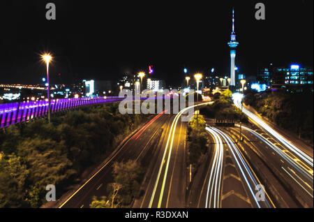 Long exposure of cars going in and out of Auckland, New Zealand Stock Photo