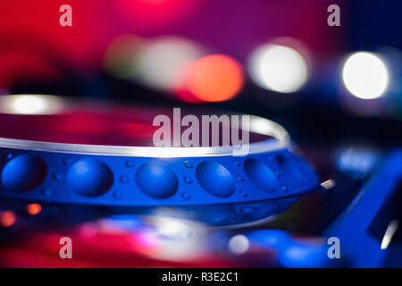 Dj mixes the track in the nightclub at a party. depth of field. closeup. Stock Photo