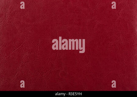 Dark red leather surface as a background, leather texture. Skin  Stock Photo