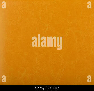 Yellow leather surface as a background, skin texture. Skin textu Stock Photo