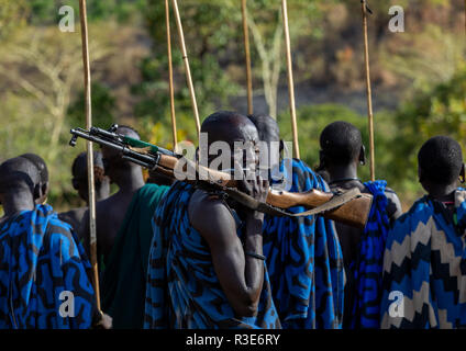 Suri tribe warriors during a donga stick fighting ritual, Omo valley, Kibish, Ethiopia Stock Photo