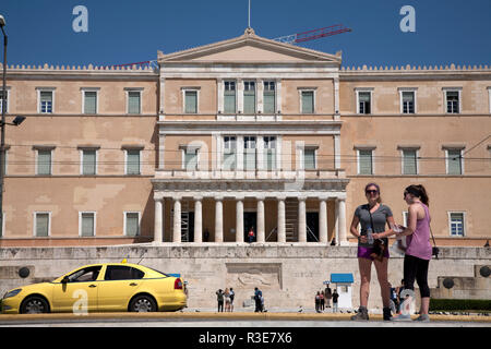 tourists vouli parliament building syntagma square athens greece Stock Photo