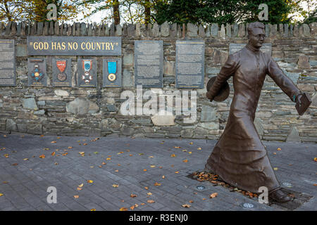 'God has no country' wall plaque at Msgr Hugh O'Flaherty bronze memorial by Alan Ryan Hall, located on Mission Road. Killarney, County Kerry, Ireland Stock Photo