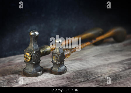 Two Hammers On Wooden Background, Tinted Image, Close-up Stock Photo 