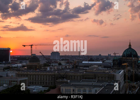 The sun sets over the north of Berlin, seen from the Fischerinsel in Berlin, Germany. Stock Photo