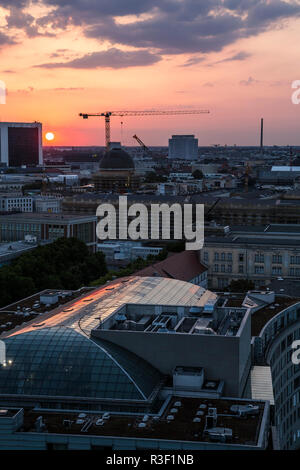 The sun sets over the north of Berlin, seen from the Fischerinsel in Berlin, Germany. Stock Photo