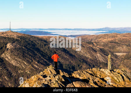 Thick fog surrounding large area of Western Norway. No wind, temperatures just above zero C (32 F). View from top of Mount Ulriken, Bergen, Norway tow Stock Photo