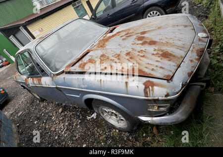 Very rusty wreck classic BMW E9 classic sports car Stock Photo