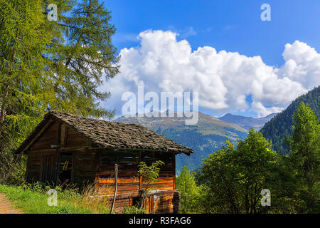 valais stable with slate roof Stock Photo