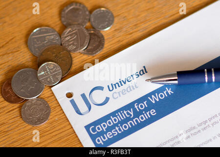 A picture shows a Universal Credit Capability for Work questionnaire form being filled out by a person off work with long term illness. UK. Nov 18. Stock Photo