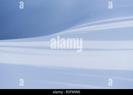 Winter abstract background with shadows on the snow Stock Photo