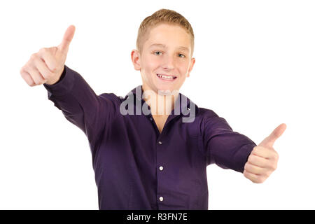 teenage boy giving thumbs up isolated on a white background Stock Photo