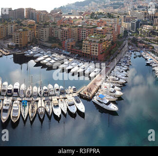 FONTVIELLE, MONACO - JANUARY 18: Fontvieille Harbour in Monaco on JANUARY 18, 2012. Aerial Photo of Fontvieille Port in Fontvieille, Monaco. Stock Photo