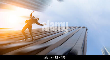 Businessman committing suicide. Mixed media Stock Photo