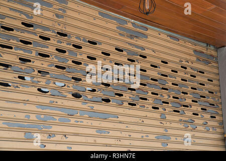 stainless rolling shutter door background, Old Slide door ,Roller shutter texture, Rusty stainless gate. Stock Photo