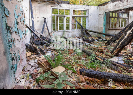 Skupowo / Poland - October 8, 2018:abandoned classroom in Skupowo, eastern Poland. There was a fire several years ago, school was never restored. Stock Photo