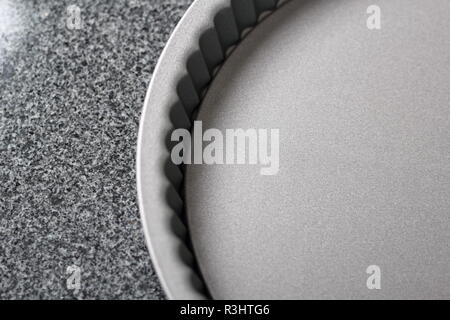 Round Fluted Cake Tin Stock Photo