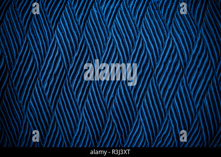 Abstract background from blue texture of old fabric with dark tone. Picture for add text message. Backdrop for design art work. Stock Photo