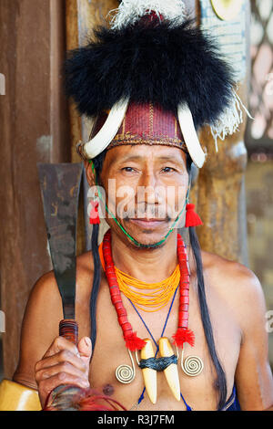 Naga tribal man in traditional outfit, Kisima Nagaland Hornbill festival, Kohima, Nagaland, India Stock Photo