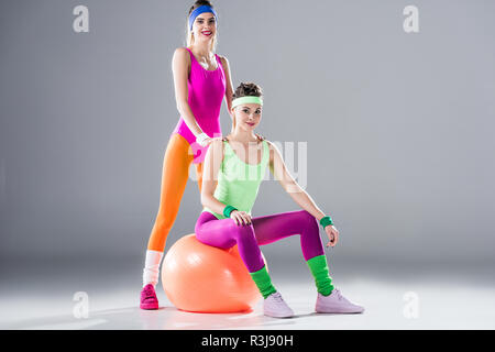 Attractive Sporty Girls In Bodysuits Training At Aerobics Workout
