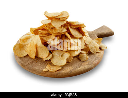 Isolated image of a large pile of crisps, on a wooden board. Stock Photo
