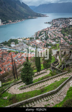 Stony trail and steps leading to the Kotor fortress above Kotor town, Montenegro Stock Photo