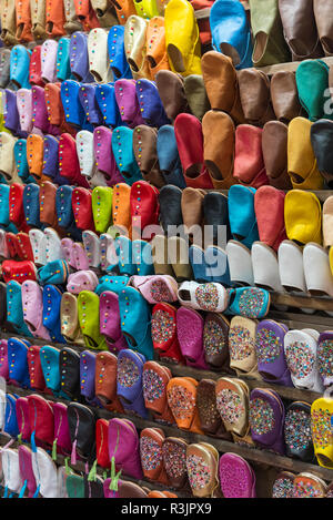 Traditional Moroccan slippers (babouches) on display in Marrakech markets, Marrakesh, Morocco Stock Photo
