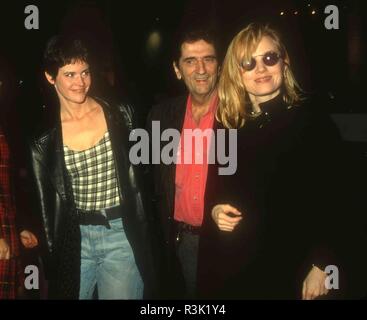 HOLLYWOOD, CA - FEBRUARY 10: (L-R) Actress Ally Sheedy, actor Harry Dean Stanton and actress Rebecca De Mornay attend 'Strictly Ballroom' Premiere on February 10, 1993 at the Galaxy Theatre in Hollywood, California. Photo by Barry King/Alamy Stock Photo Stock Photo