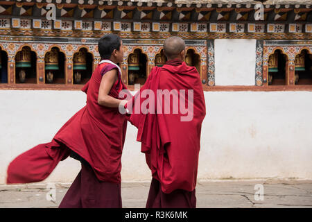 Bhutan, Paro, Rinpung Dzong. Novice monks at 15th century Buddhist monastery and fortress. Tentative List for UNESCO inclusion. Stock Photo