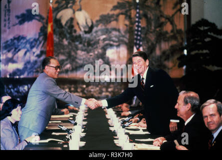 April 1984: President Reagan shaking hands with Chinese Premier Zhao Ziyang during a visit to China. Stock Photo