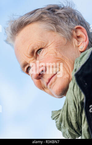 laughing happy senior woman senior in autumn outdoors Stock Photo
