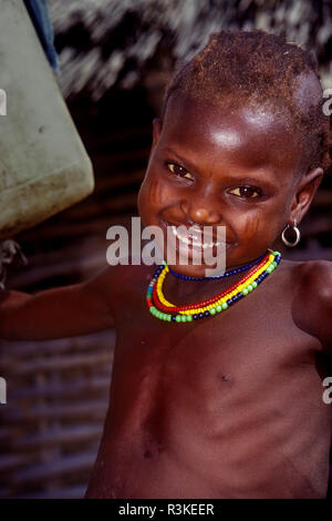 Young girl in the Bedik village called Damba or Dambakoi in Southeast Senegal. Sub-Saharan Africa, Senegal, Bedik, tribe, Dambakoi village. (MR) Stock Photo